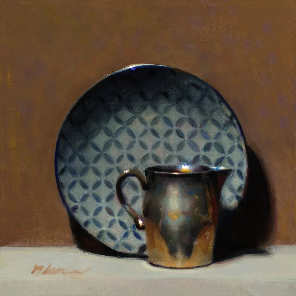 A still life painting features a reflective metallic pitcher in front of a patterned blue and grey plate. The objects are set against a brown background on a white surface, showcasing elegant light and shadow interplay.